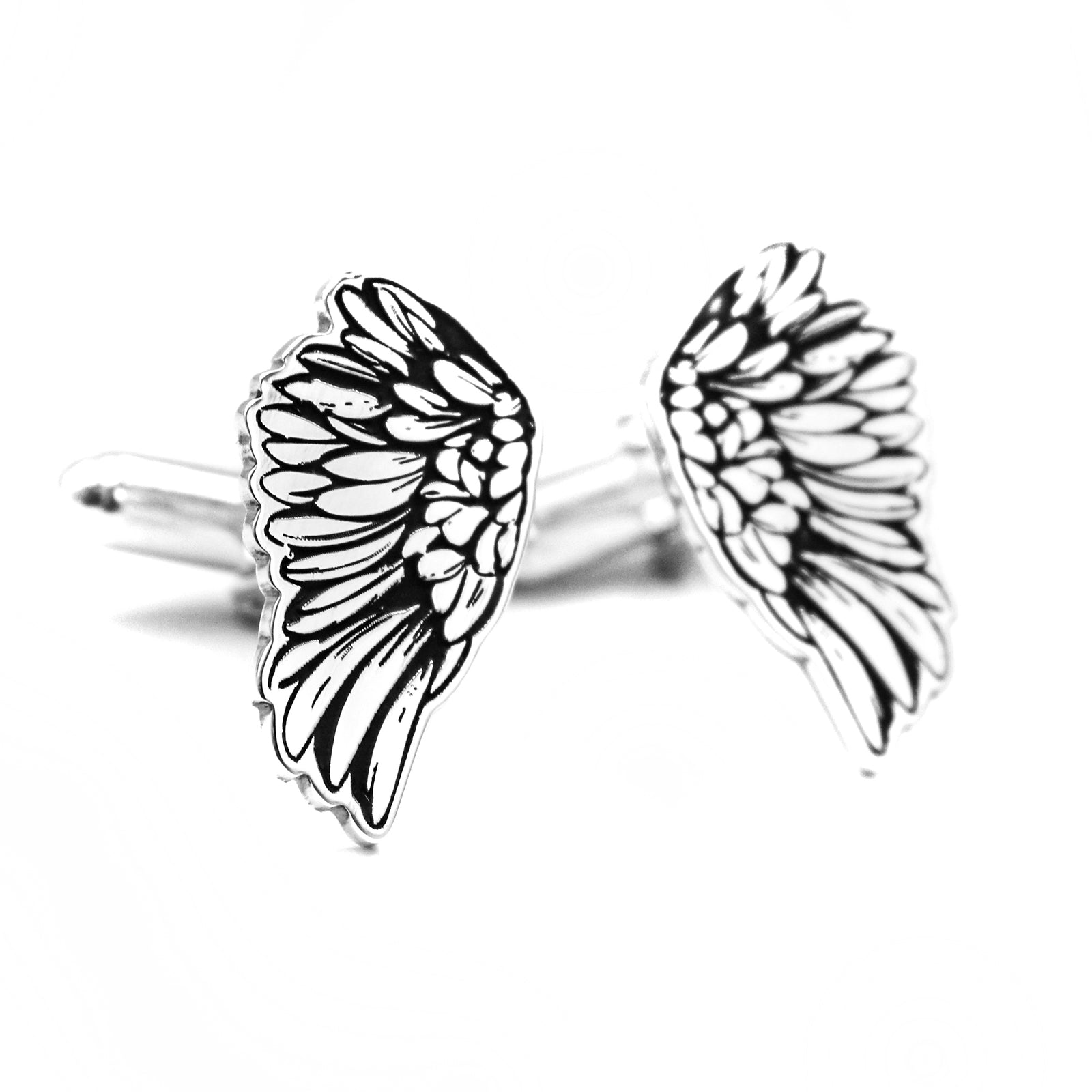 Gemelos de Plata en Forma de Alas