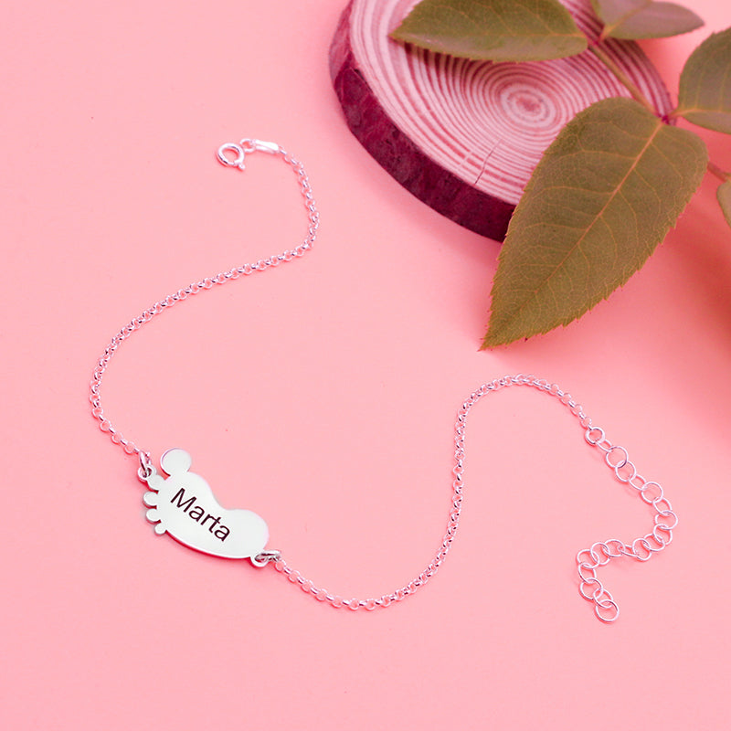 Tobillera de plata con hasta 3 piecitos