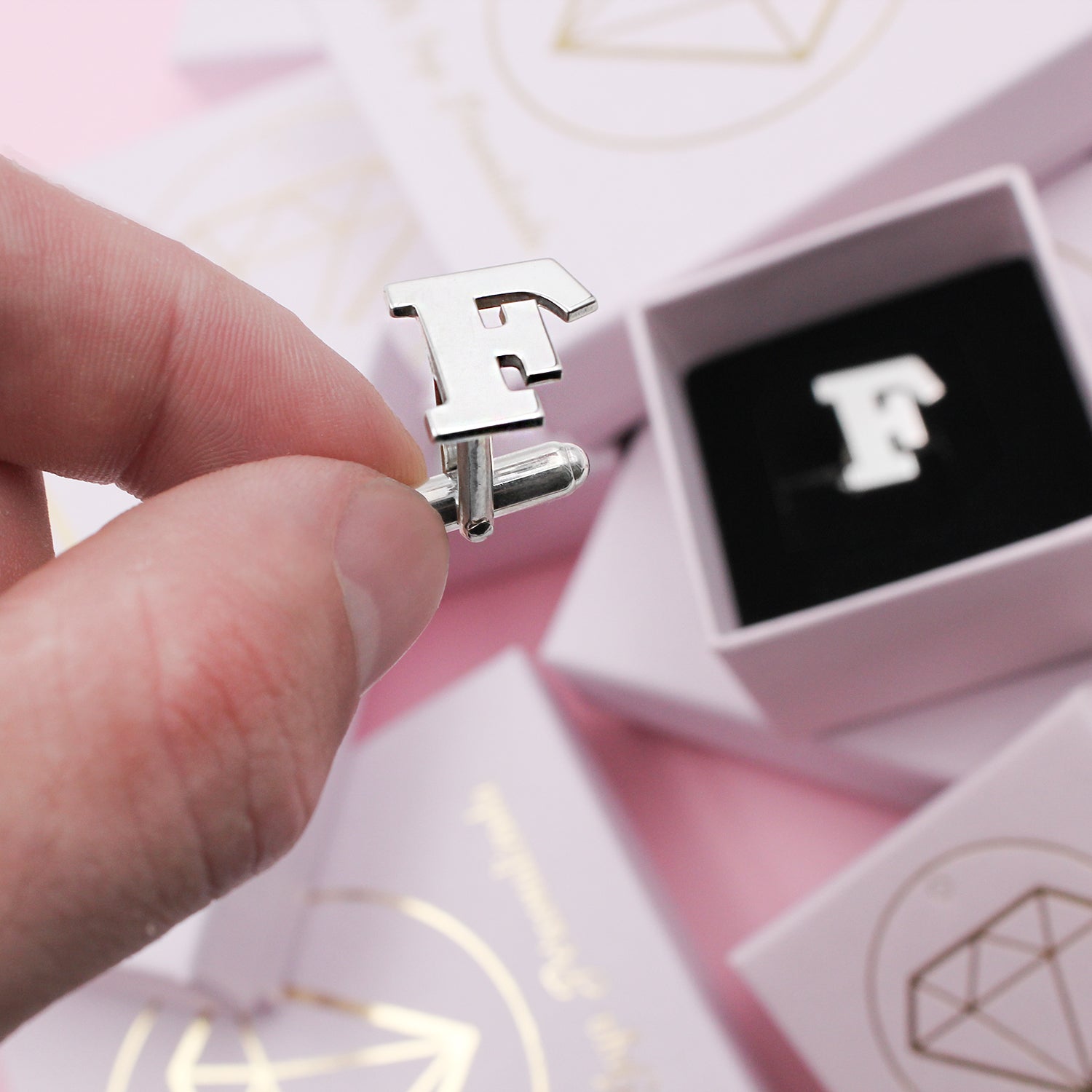 Gemelos de plata personalizados con inicial