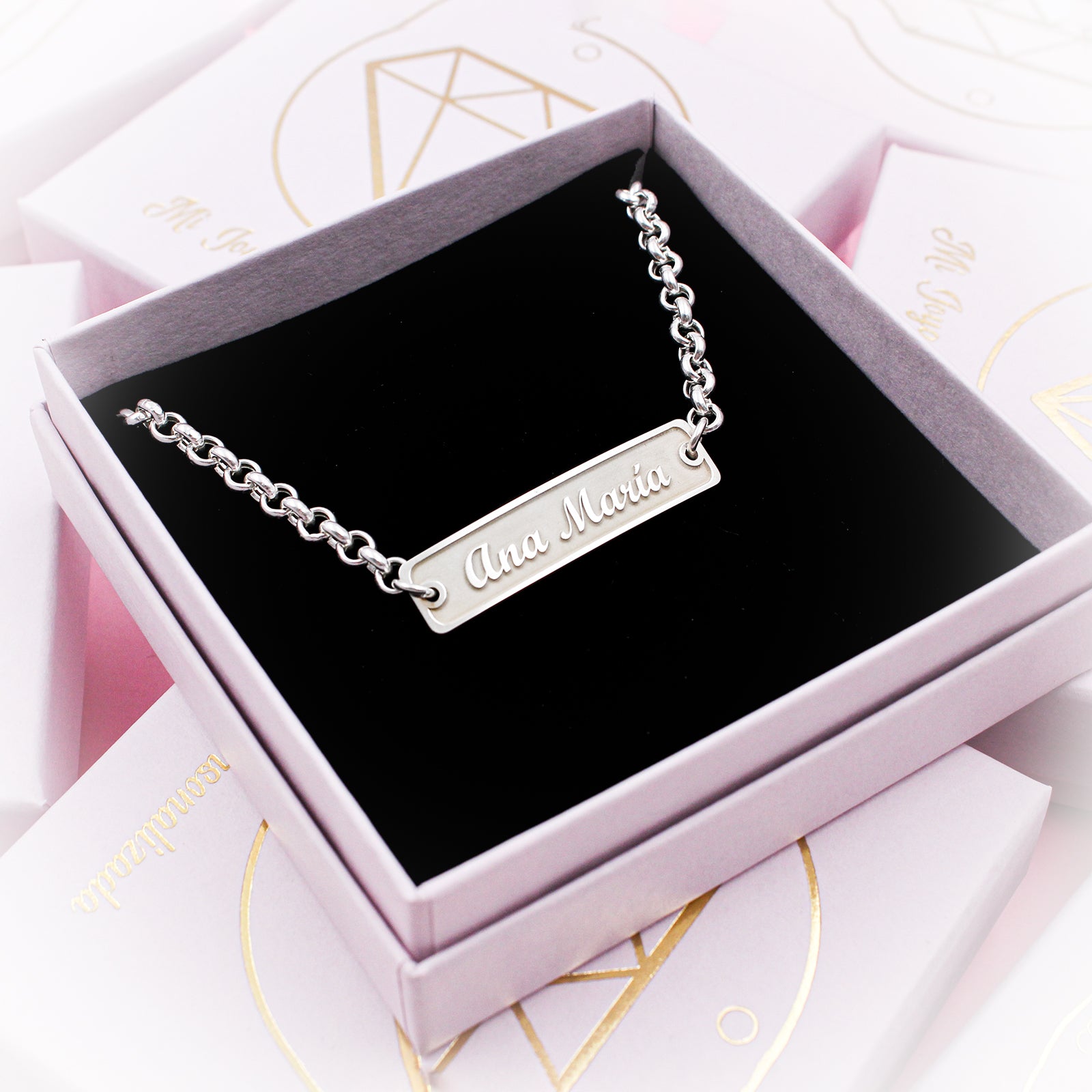 Pulsera esclava plata con nombre en relieve